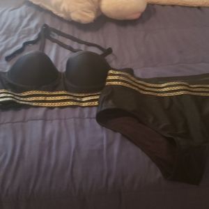Black and gold two piece never worn!!